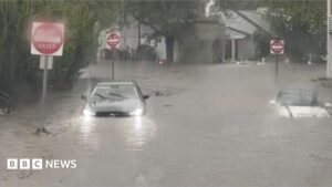 Flash flooding interrupts half-marathon, submerges cars