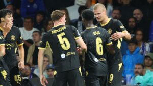 Haaland scores twice in win over Porto but Man City struggle to impress