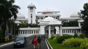 Action sought against Periyar University professor for participating in DMK function
