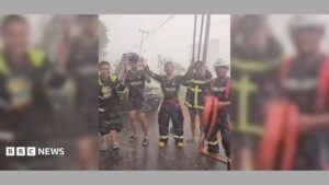 Firefighters celebrate rain during Indonesia wildfires