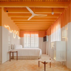 OHLAB experiments with colour-blocking and cork in old and new buildings of Terreno Barrio Hotel in Mallorca